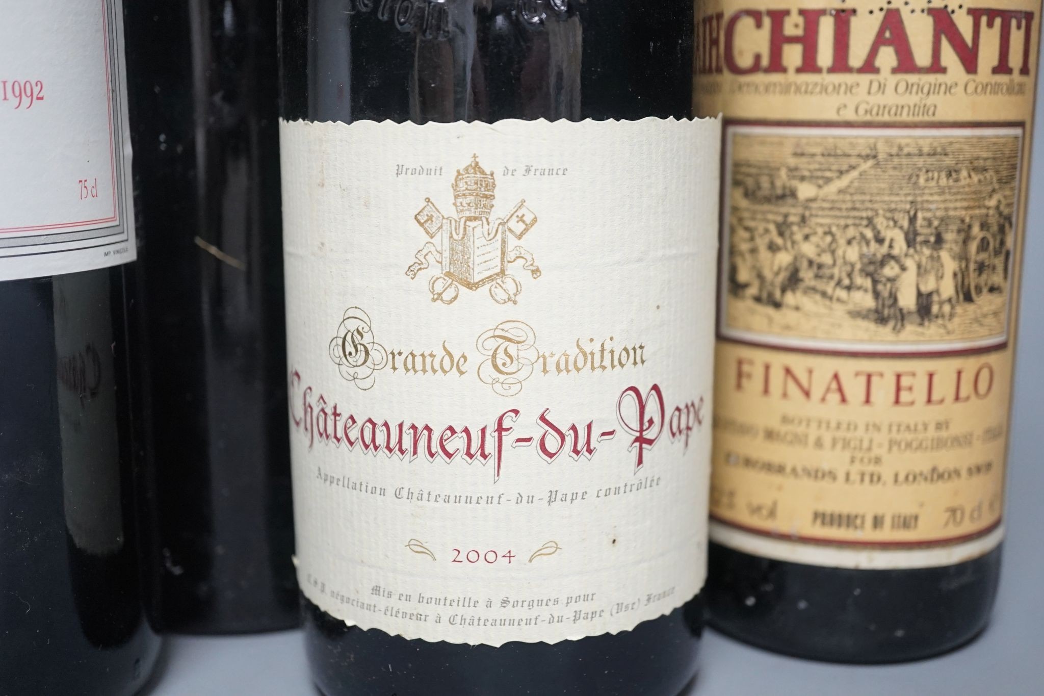 A bottle of Warres 1963 Vintage Port, a bottle of Fonsecca, 1977 Vintage Port and three bottles of wine